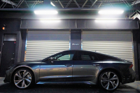 アウディ RS7 パノラマサンルーフ カーボンブレーキ カーボン＆グロスブラックスタイリングパッケージ  OP22インチホイール  中古車